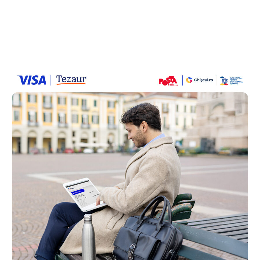 man sat on bench searching on laptop